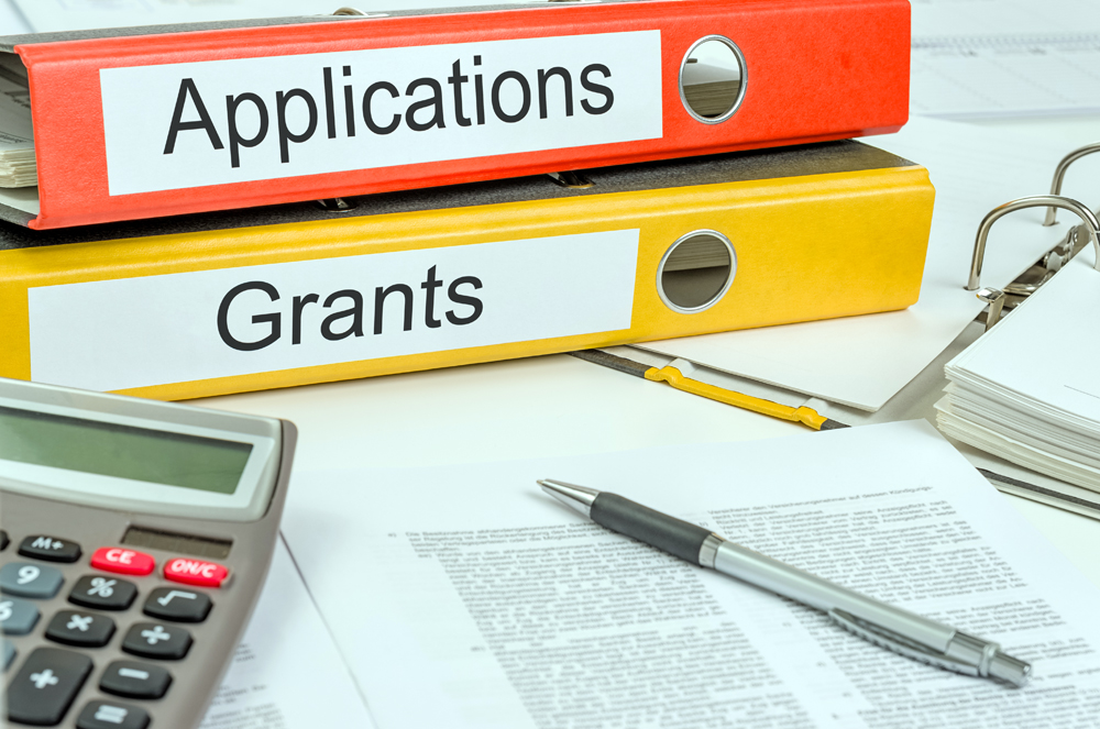 Folders,With,The,Label,Applications,And,Grants