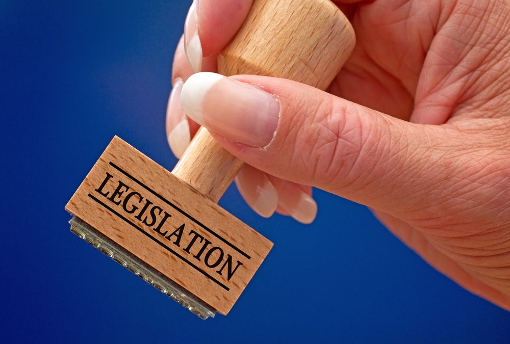 Legislation, ,Female,Hand,With,Stamp