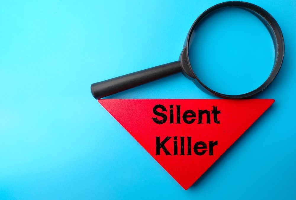 Magnifying,Glass,And,Colored,Tangram,Written,With,Text,Silent,Killer