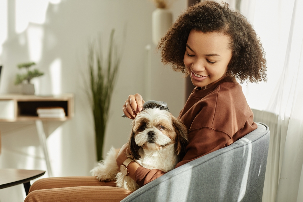 Candid,Portrait,Of,Young,Black,Girl,Brushing,Pet,Dog,While