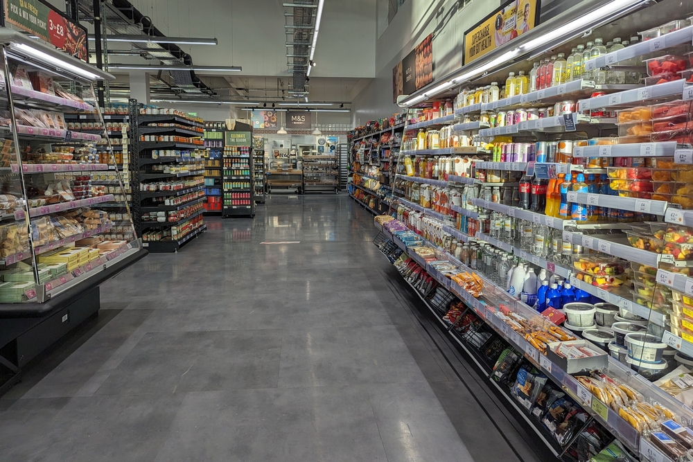 An,Aisle,With,Shelves,Full,Of,Food,Products,Is,Seen