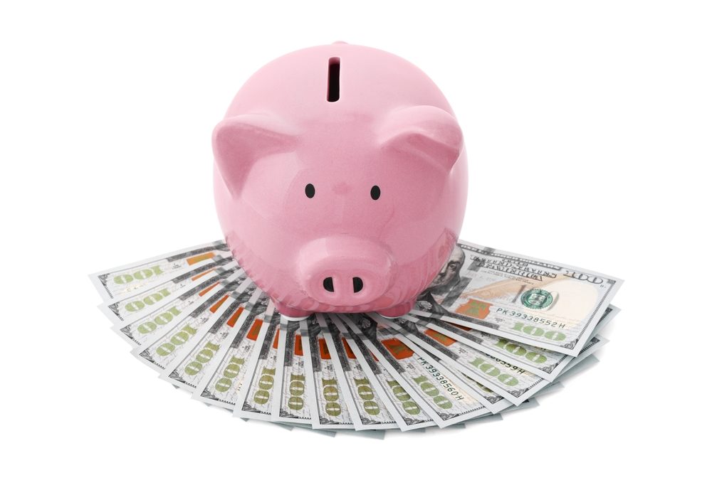 Pink,Piggy,Bank,And,Money,On,White,Background