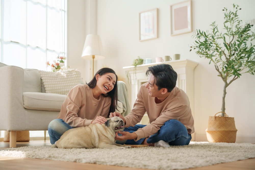 Asian,Couple,Shares,A,Joyful,Moment,While,Playing,With,Their