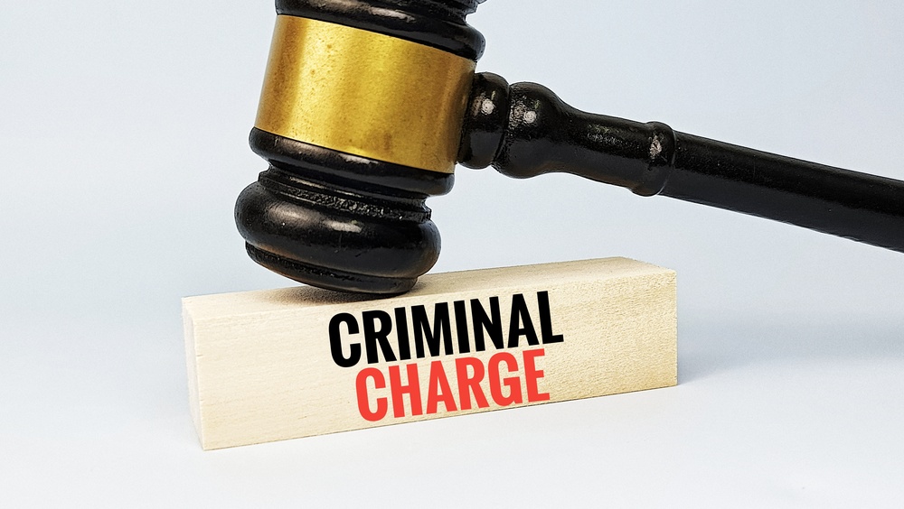 Judge,Gavel,On,Wooden,Block,With,Text,Criminal,Charge,Representing